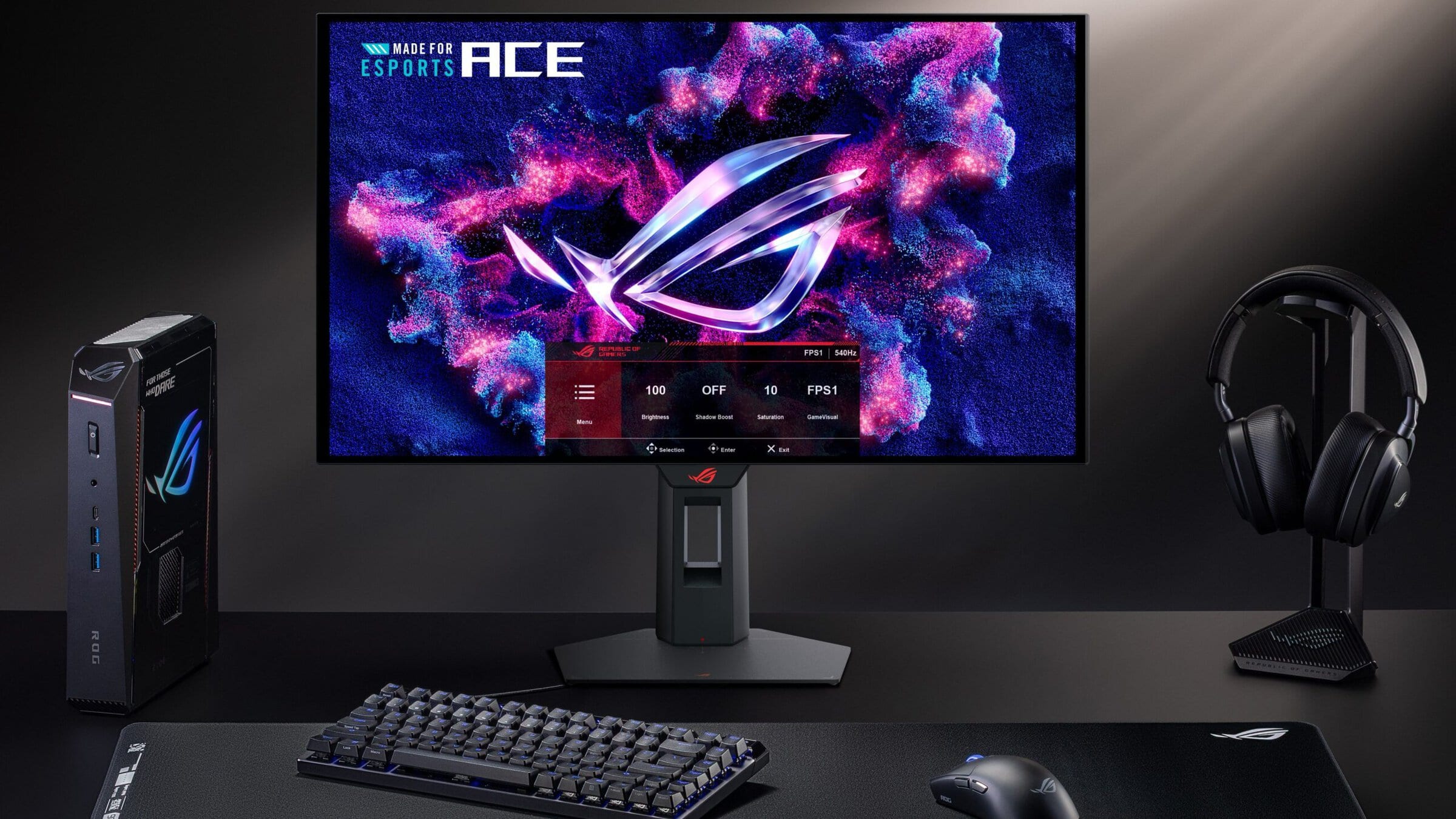Robuuste gaming pc, ASUS ROG monitor, gaming headset en toetsenbord voor optimale game-ervaring.