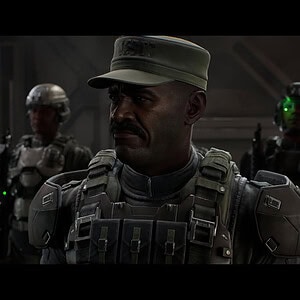 Soldaat in Halo: Campaign Evolved met andere soldaten op de achtergrond in een donkere setting.